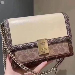 Coach snakeskin leather signature Hutton bag cream color